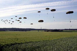 Parachutes in Normandy sky